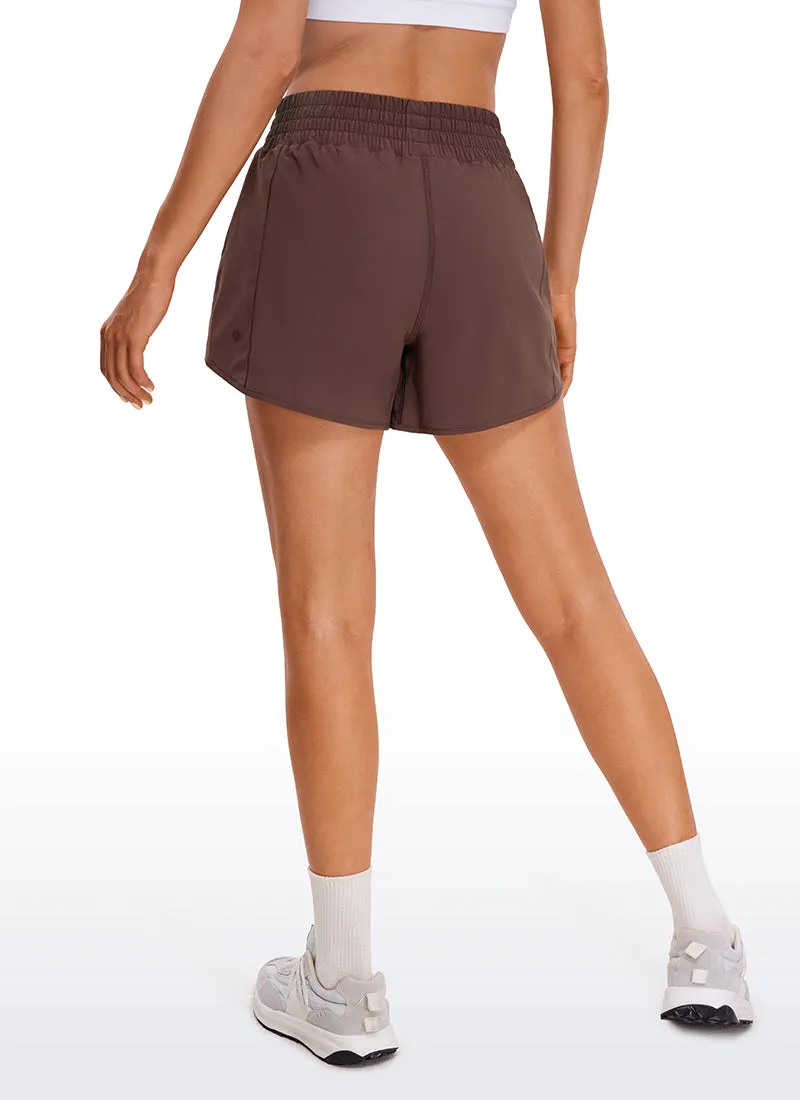 Feathery-Fit Soft High Rise Mesh Liner Shorts with Zip Pockets 4''